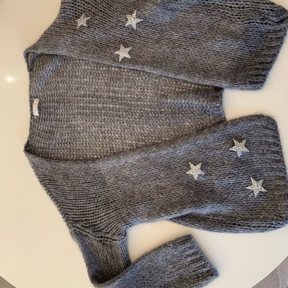 Scandal sweater with silver stars size medium